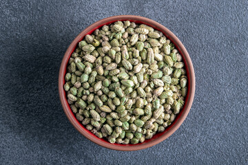 A bowl full of natural dried thyme, top view