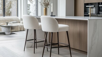 Modern kitchen with boucle bar stools and elegant decor