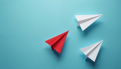 Red paper plane leads two white planes on blue background. Origami planes represent business leader taking bold moves for success. Leadership, innovation, strategy, direction concept. Start up