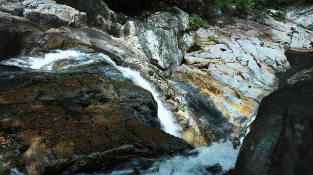 The top of the waterfall in the rocky jungle
