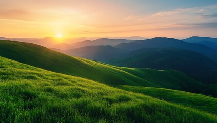 Obraz premium Golden Sunset Over Rolling Hills A Beautiful Landscape with Lush Green Fields and Distant Mountains at Sunset with a Warm Glowing Sky