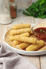 Mozarella sticks with barbeque sauce