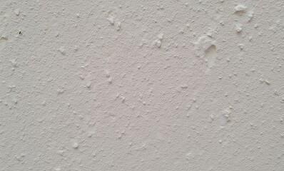 Close-up of textured white wall surface