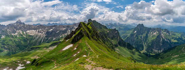 Lush Alpine landscape with dramatic peaks and clouds in Bavaria Allgau Alps near Oberstdorf