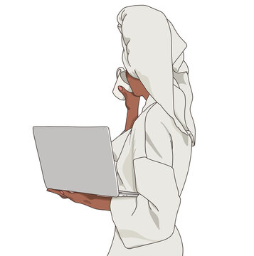 Woman in a Towel Working on a Laptop