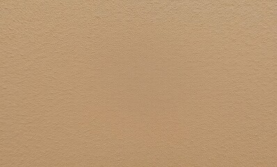 Textured sandy beige wall surface.