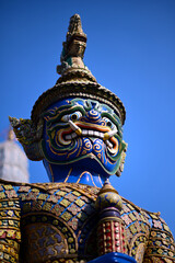 Close up the face of the Giant at ​​Wat Phra Sri Rattana Satsadaram,Bangkok. Acting as gatekeepers, standing guard over the archways of the cloister at the entrance and exit of the ordination hall. 