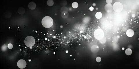 Bright swirling orbs creating a stunning abstract visual effect in black and white