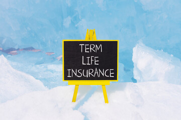 Term life insurance symbol. Concept words Term life insurance on beautiful black yellow blackboard....