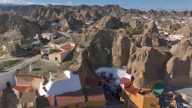 Guadix Cave Houses, Dewlling troglodyte city. Aerial of Prehistoric caves settlement in the mountains of Granada, Spain