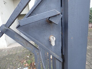 metal door handle of an iron gate