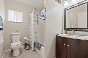 an interior view of a home bathroom 