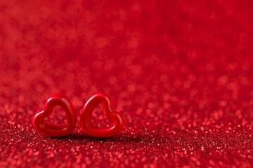Decorative hearts on shiny red background, space for text. Happy Valentine's day