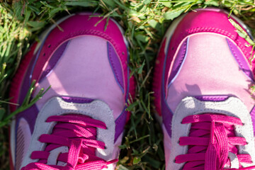 Pink and purple and white women shoes close up. High quality photo