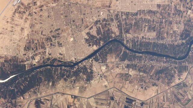 Aerial high altitude airplane top down view of Najaf Iraq it is widely considered amongst the holiest cities of Shia Islam and one of its spiritual capitals as well as the center of SPP 4k animation