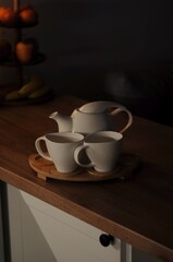 White porcelain tea set on table