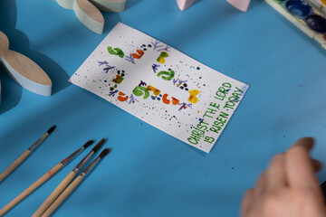 Drawing Easter cross Storytelling of creating craft Easter greeting card holiday present. Tactile...