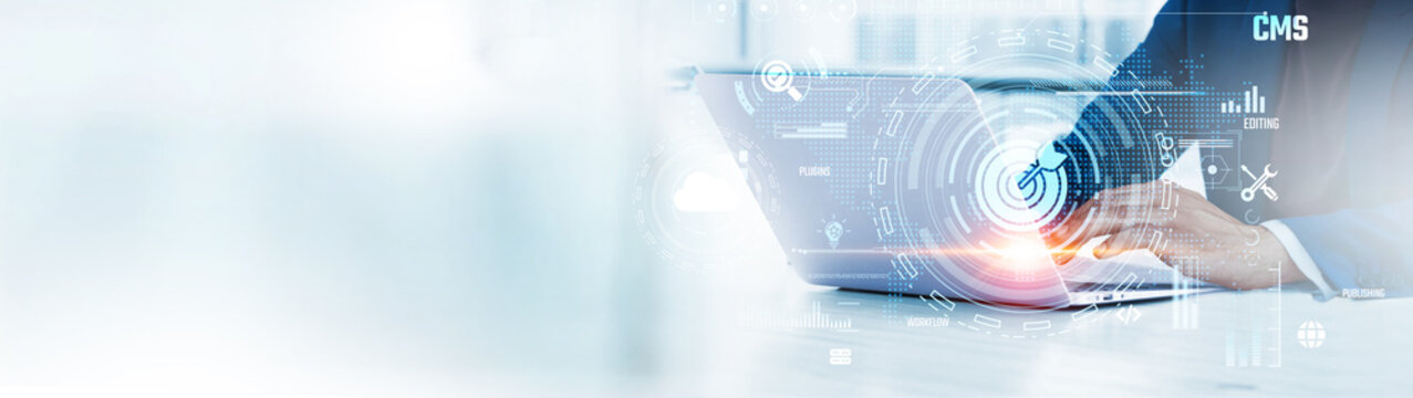 CMS : Businessman uses laptop to analyze and develop various information about website content on future virtual interface. Website management, digital publishing, content optimization