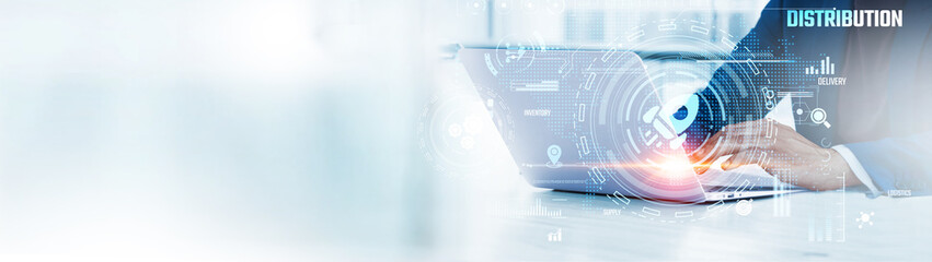 Distribution: Businessman uses laptop to analyze and develop various information about supply chain...