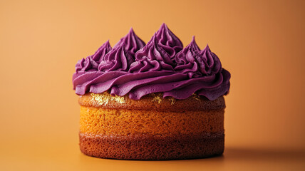 Cake with purple frosting on an orange background.