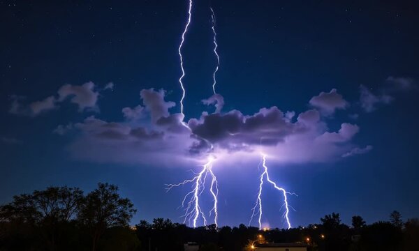 Lightning bolts strike under dark stormy sky at night creating dramatic electric storm with bright flashes and powerful energy in nature. 