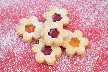 Linzer cookies filled with strawberry and apricot jam. Easter baking