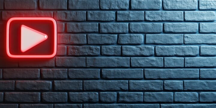 Red Neon Play Button on Dark Brick Wall