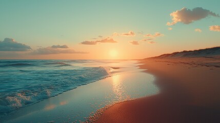 Fototapeta premium Golden sunset over tranquil beach waves