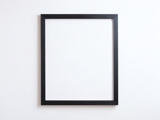 Black picture frame against a plain wall ready for decoration or artwork