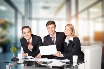 Happy busy office worker working in modern office.