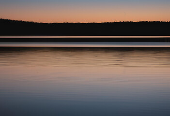 lunar glow reflecting on water surface
