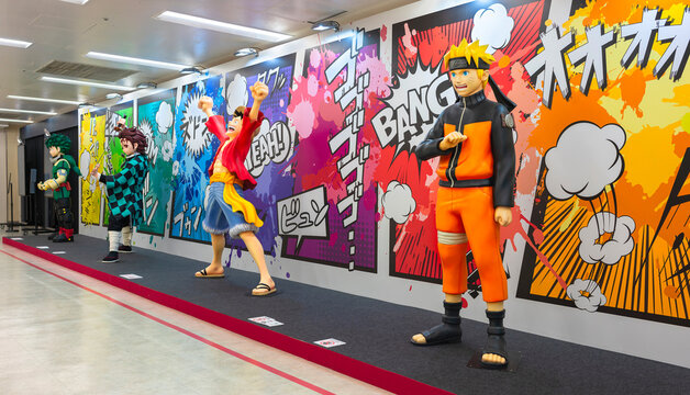tokyo, ikebukuro - jul 09 2024: Life-size figurines of Japanese manga and anime heroes from Naruto, One Piece, Demon Slayer and My Hero Academia displayed at the free event 20th Jump Store Festival.