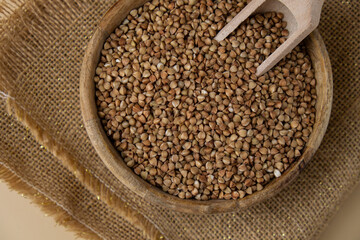 Raw buckwheat porridge Gluten free cereals. Health gut benefits. Concept of alternative whole spelt grain ingredient. Vegetarian diet recipes. Plant-based lifestyle. Copy space Protein rich eating 