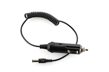 Automotive electronics. Electric adapter for charging devices into a Car cigarette lighter isolated with white background.