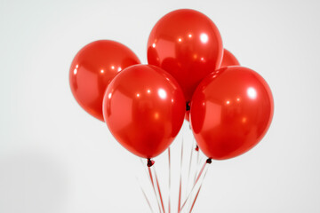 Red balloons on a white background