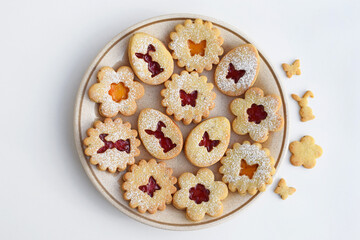 Linzer cookies filled with strawberry and apricot jam. Easter baking