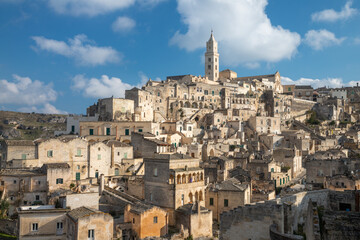 Naklejka premium Matera - The cityscape with the cathedral tower in evening light.