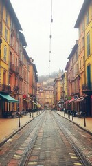 Naklejka premium Charming street lined with colorful buildings and tram tracks.