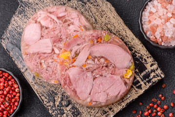 Homemade brawn with salt, spices, herbs and vegetables