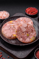 Homemade brawn with salt, spices, herbs and vegetables