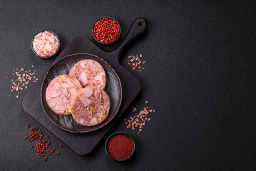 Homemade brawn with salt, spices, herbs and vegetables