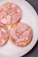 Homemade brawn with salt, spices, herbs and vegetables