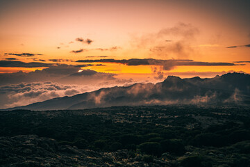 Sunset over a foggy and misty mountain top in Kilimanjaro Tanzania Africa