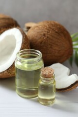 Bottles of coconut oil on the table