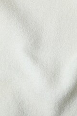 White fabric background, close up view