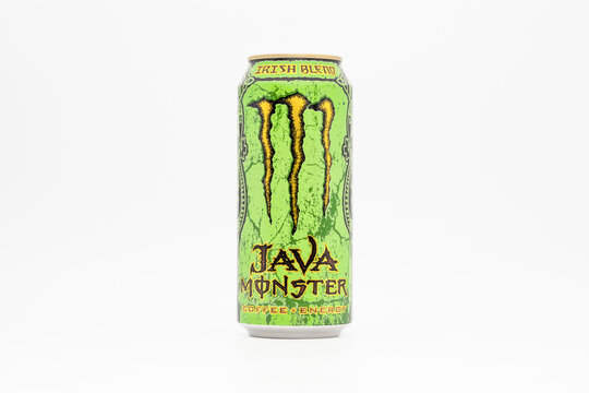 DRESDEN, GERMANY - 28. December 2024: Monster Java Irish Blend beverage. The energy drink is a blend with creamy Irish coffee. The can design from 2012 is a textured green with a golden claw.