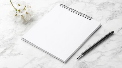 Blank notepad, pen, flower on marble.  Lifestyle blog, website mockup