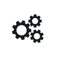 Fototapeta premium Three black gears in a mechanical arrangement