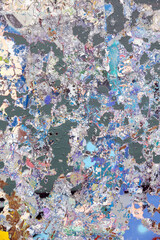 Abstract textured painting with layers of peeling paint in cool and warm tones. A visually striking...