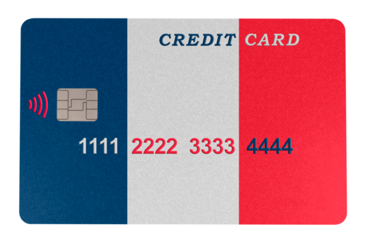 Plastic credit card in the shape of the flag of France on a transparent background (close-up). Online payment by credit card for purchases in online stores. Banking, e-commerce and business concept